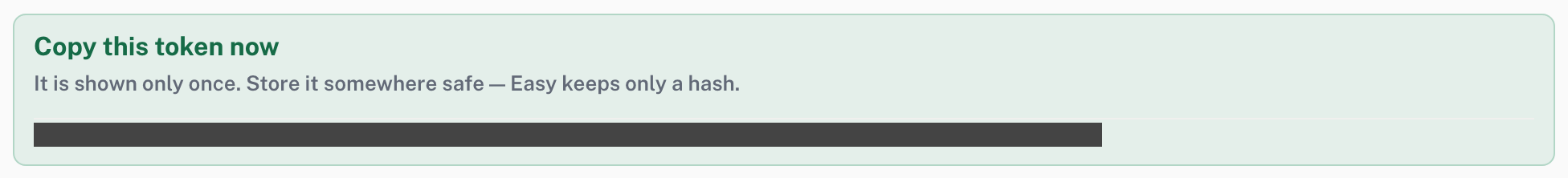 The token is shown once: copy it now