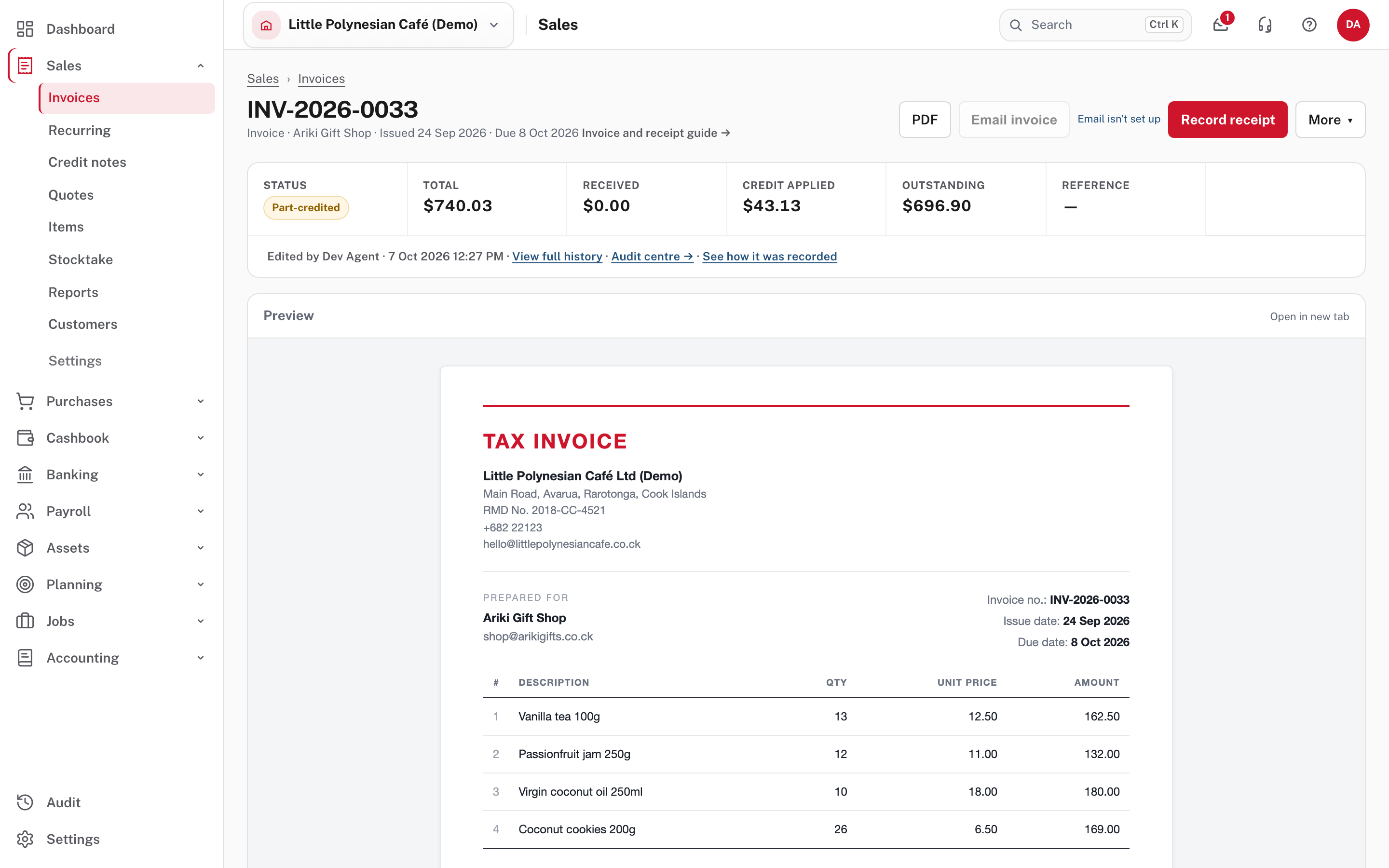 The invoice after: part-credited, with the credit applied and a smaller amount outstanding